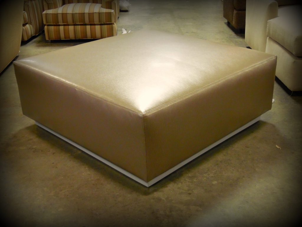 Square ottoman with recessed metal base