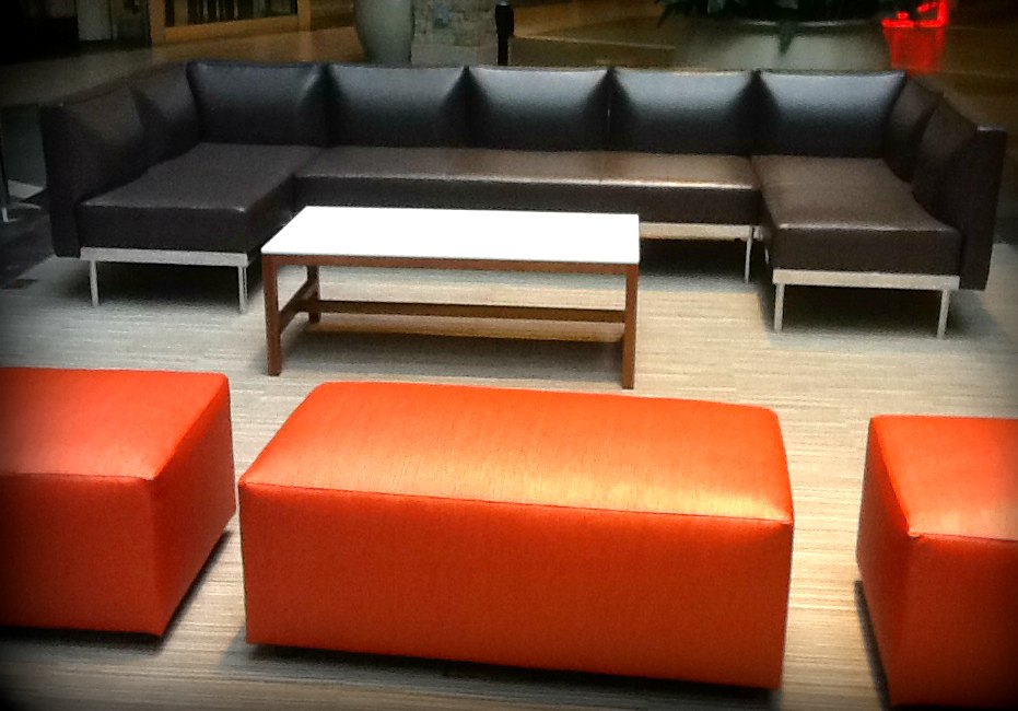 This basic rectangular ottoman with recessed feet gets a boost of color from its commercial-grade vinyl textile.